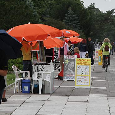 eby mc robi tatuae musieli kupi parasol z logiem miasta