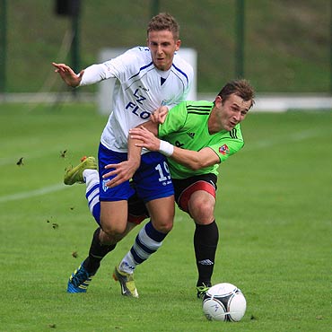 Rado z wygranej w strugach deszczu. Flota - Dolcan 2:0 (0:0)